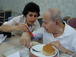 Brenda Avadian teasing her father, Martin during a meal.