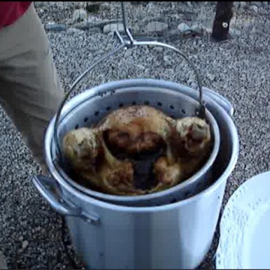 Avadian_Removing Turkey from Deep Fryer_2012