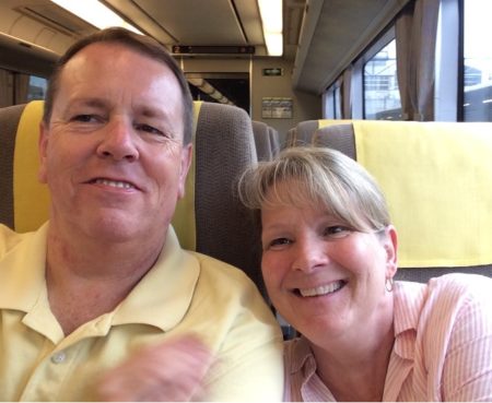 John Sandblom and his wife, Cindy, riding the train in Kyoto, Japan - 2017