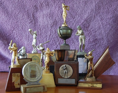 Ginny's fast-pitch softball trophies