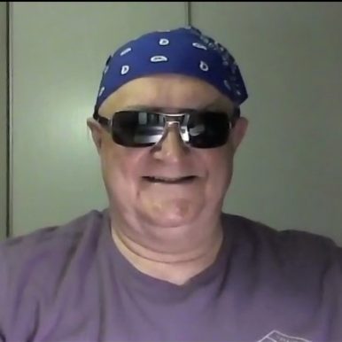 Mick Carmody's lookin' cool with his shades and bandana!