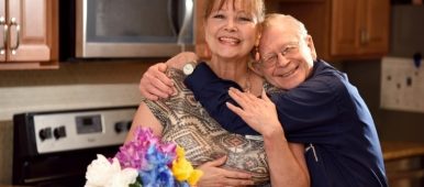 Father hugging Caregiver at Providence Place