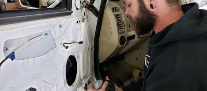 Illustration of doing the job right - Vinnie of Meece Car Audio installs new speakers in my car-