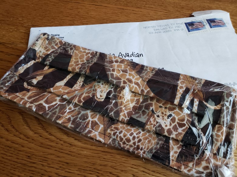 Michelle Peace's giraffe face mask mailed to Brenda Avadian