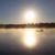 Lone boater on Stone Lake in Wisconsin at sunrise