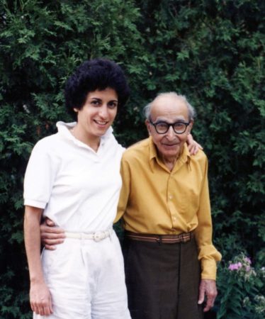 Brenda Avadian with her father, Martin Avadian, standing under his apple tree