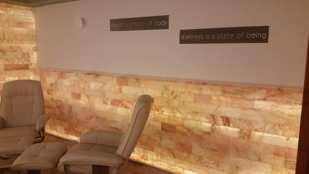Room dedicated to a Himalayan salt bath room at Kalahari resort in Wisconsin with the words: Health is a state of body Wellness is a state of being