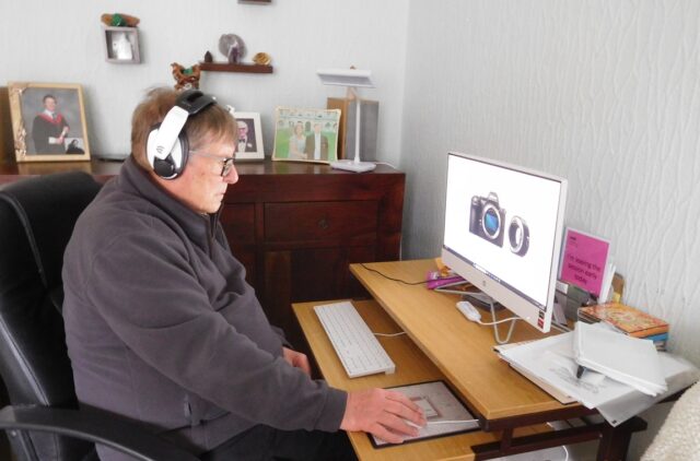 James McKillop at computer