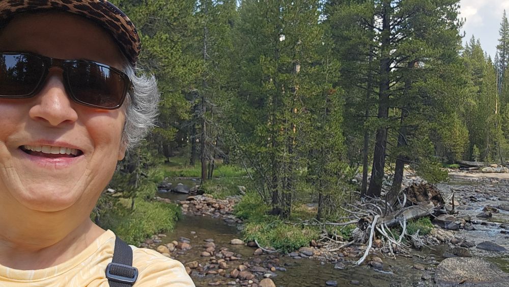 Brenda Avadian solo hiking in Yosemite at Tuolumne Meadows