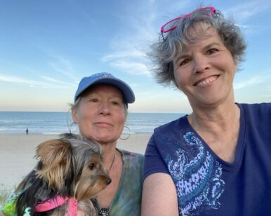 Carol-Lindsay-and-sister-Marjorie-holding-dog-at-Carolina-beach-2024